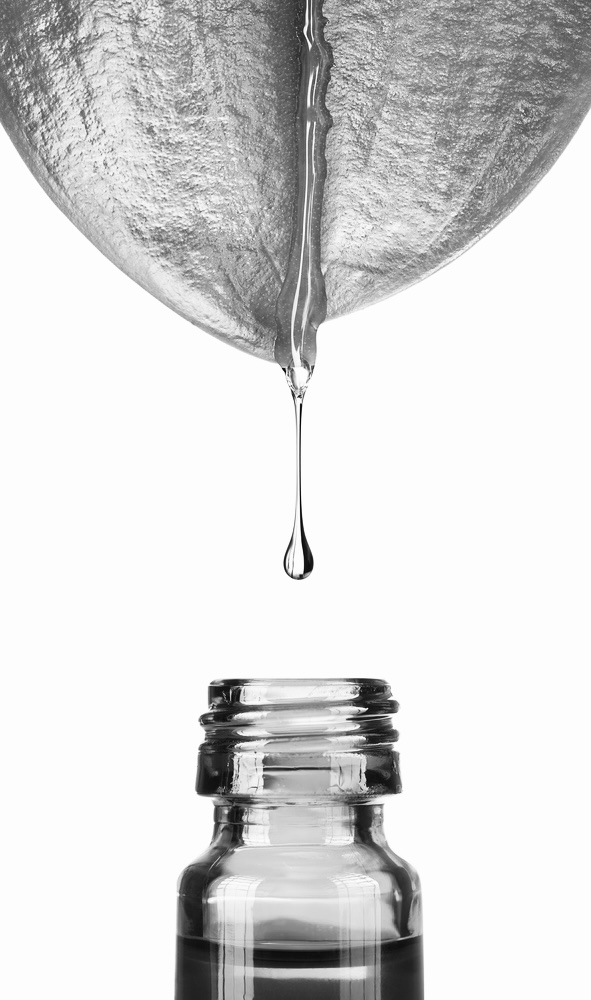 Herbal,,Alternative,Medicine,,Water,Drop,Falling,Down,From,A,Leaf